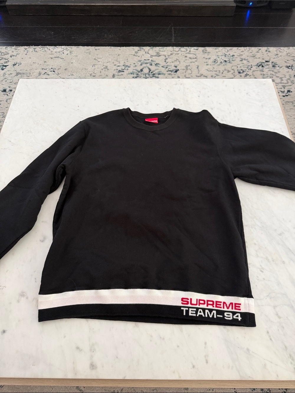 Supreme Team 94 Black Crewneck with Red & White Hem Branding